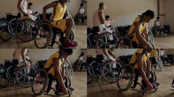 轮椅篮球运动员准备比赛。