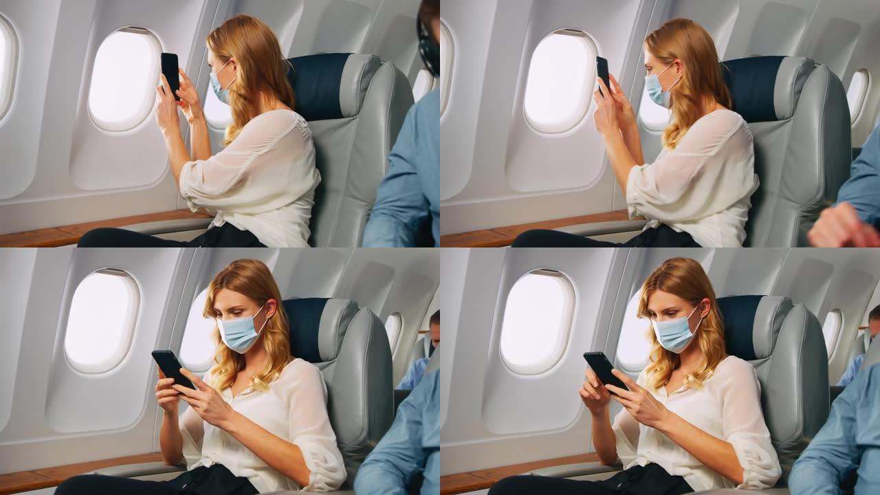 飞机上的智能手机拍摄外国美女商务舱