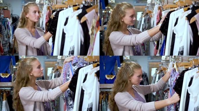 年轻女子在服装店购物