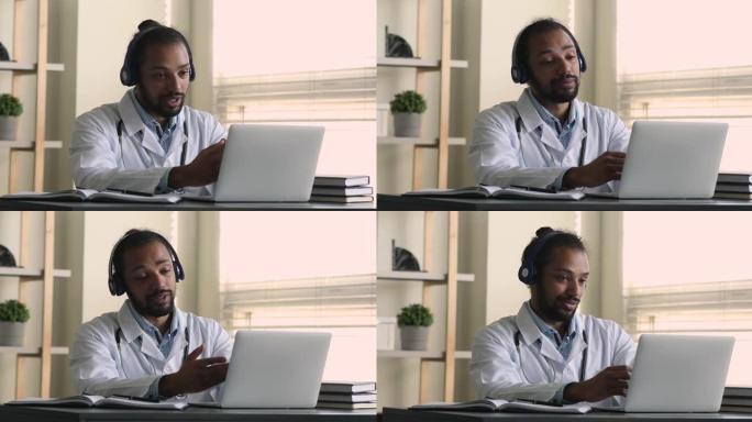非洲医生坐在工作场所迎接患者开始视频通话