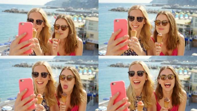 在意大利海岸的一个夏日里，两名年轻女子吃冰淇淋和自拍的4k视频片段