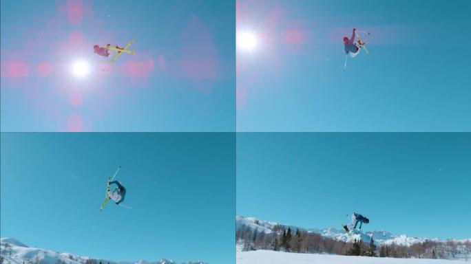 慢动作: 年轻的男运动员在白雪皑皑的滑雪胜地的雪地公园里跳着大空气