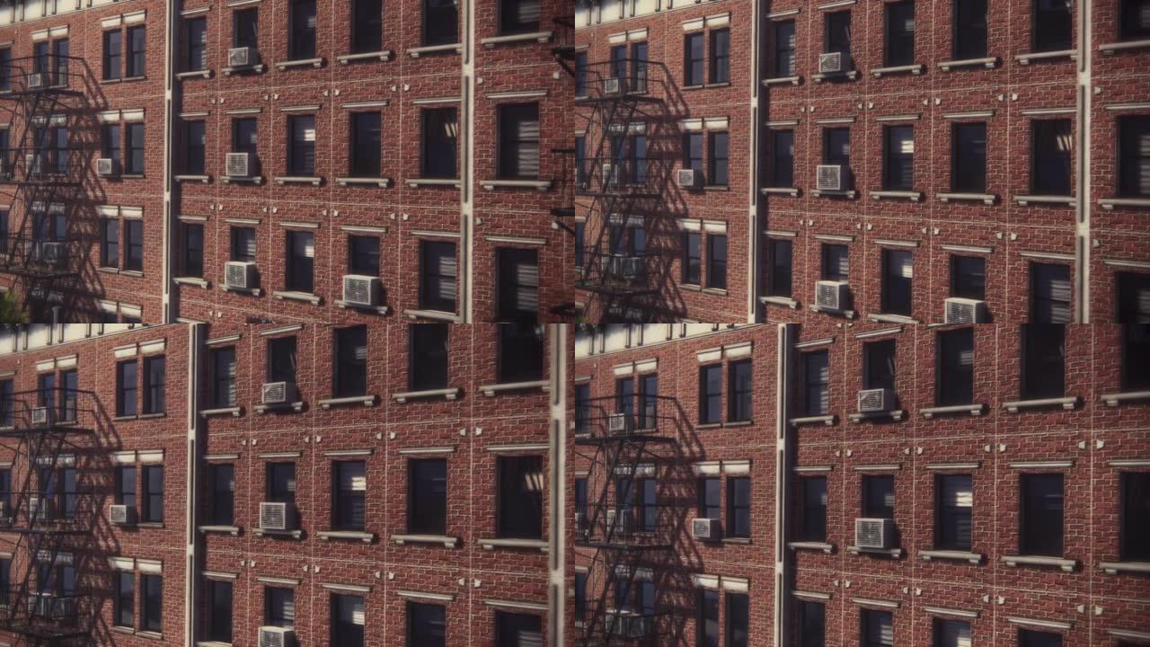 建立者:放大拍摄公寓窗口在3D视觉特效动画砖多层建筑。翻新的旧褐石屋。有紧急楼梯和空调的房子的白天场