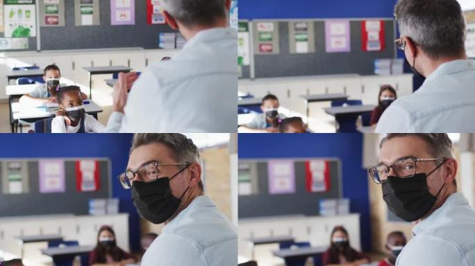 多元化的老师在教室里与孩子们一起上课，都戴着口罩