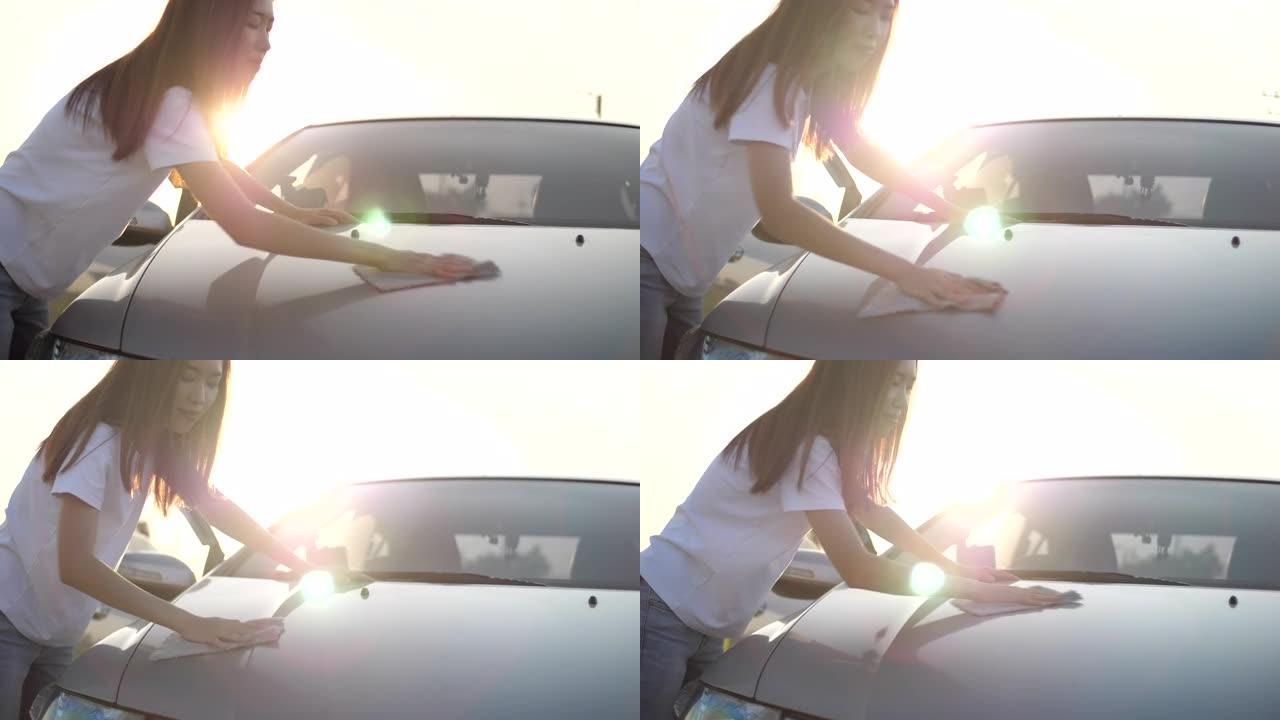 一个亚洲女人在洗车
