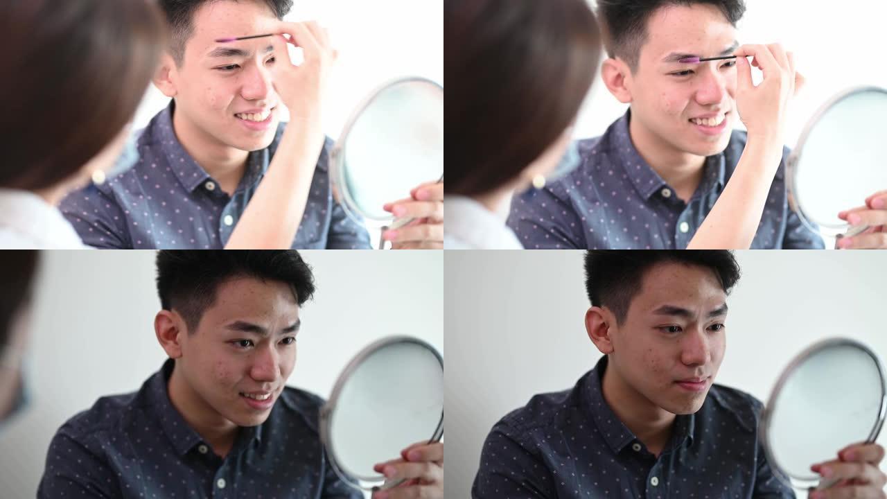 亚洲中国美女在为一个年轻人做眼睛刺绣之前刷牙和画画