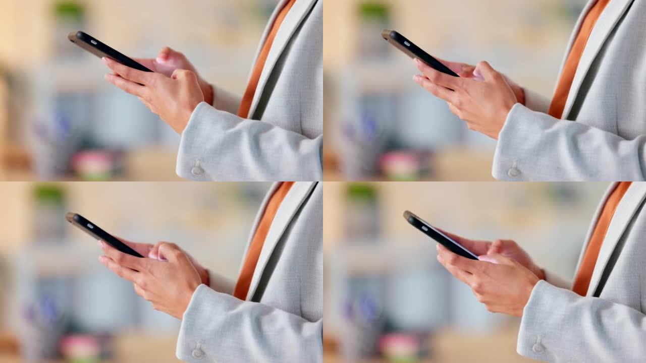 一个女商人在办公室里用电话发短信的特写镜头。公司高管的手在一边快速打字，同时滚动消息，浏览应用程序并