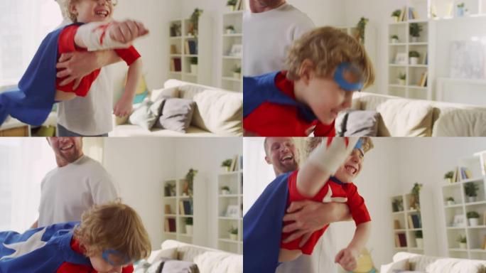 儿子模仿父亲怀抱中的苍蝇