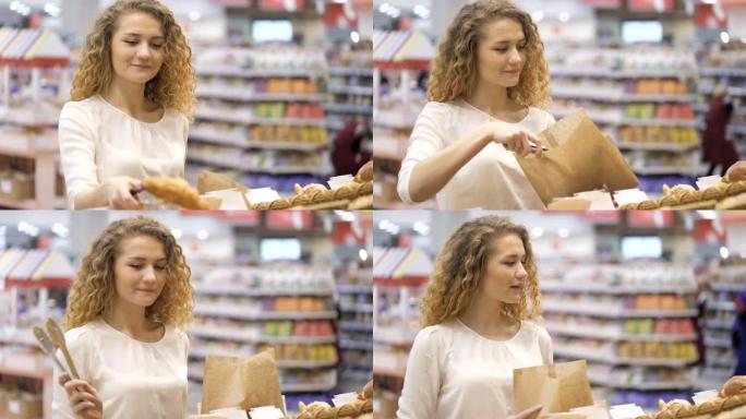 女人在面包店杂货店买面包。一个30多岁的人在烘焙购物。年轻女性在市场上看和拿产品。在超市选择和购买羊