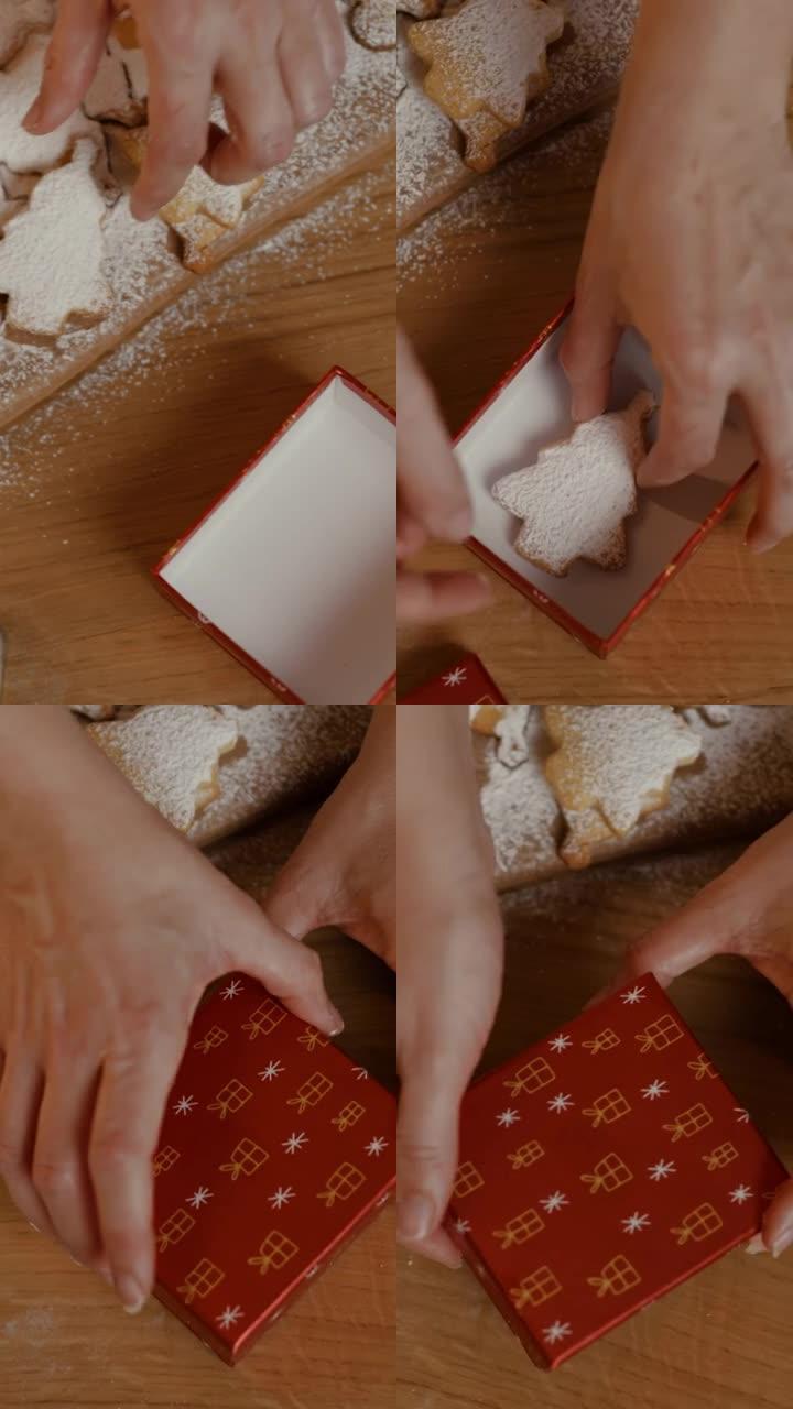 面包师在姜饼饼干上撒上糖粉，并包装在礼品盒中