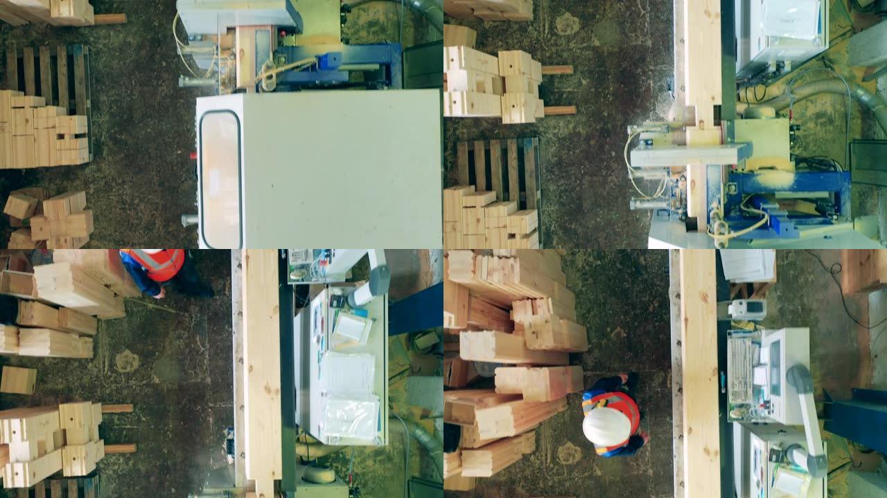 木材穿过工厂机器的俯视图