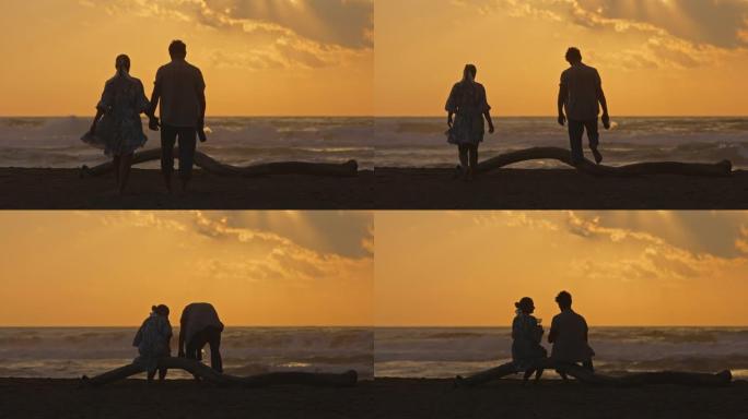 意大利撒丁岛海滩上一对夫妇的慢动作视图。