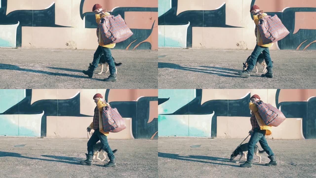 一个无家可归的人带着他的狗在街上散步