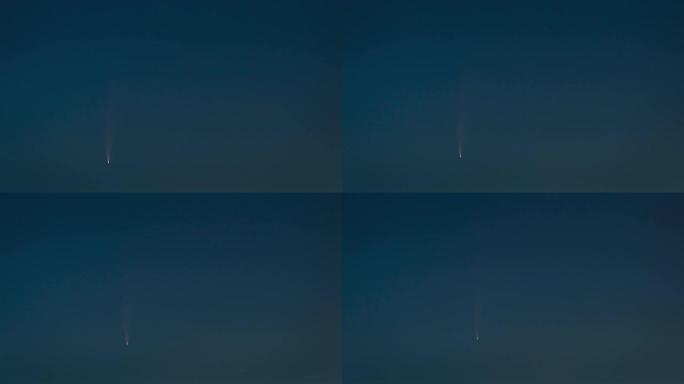 傍晚星空背景上的飞行彗星