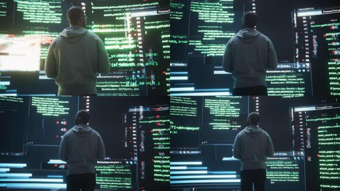 年轻的黑人在显示代码行时看着大数字屏幕出现故障。担心专业程序员修复错误，处理崩溃的系统，确保网络安全