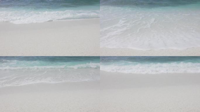 撒丁岛海滩上波浪滚动的慢动作视图。