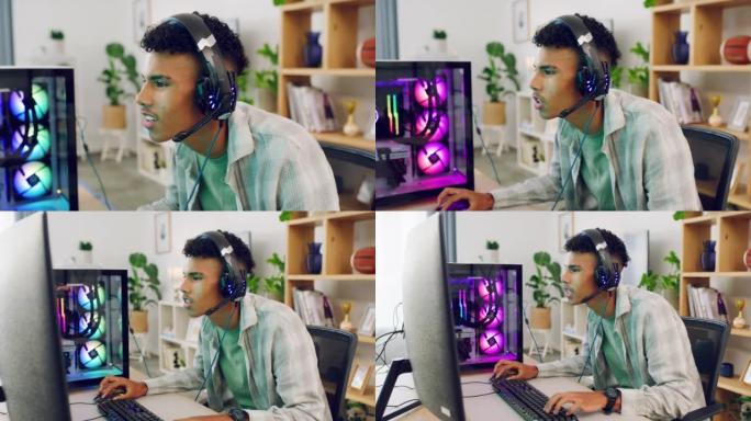 一个集中的游戏玩家在他的电脑显示器上用最新的耳机装备玩视频游戏。年轻的时髦家伙在多人游戏模式下玩电子