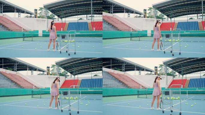 亚洲年轻女子打网球身体健康。