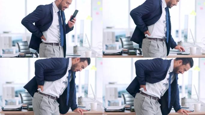 背痛的商人通过电话与脊医或物理治疗师预约。受伤的专业人员背痛，坐骨神经压力或因办公椅不佳而抽筋