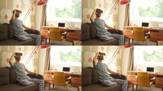 一个年轻人在家中使用VR耳机的4k视频片段