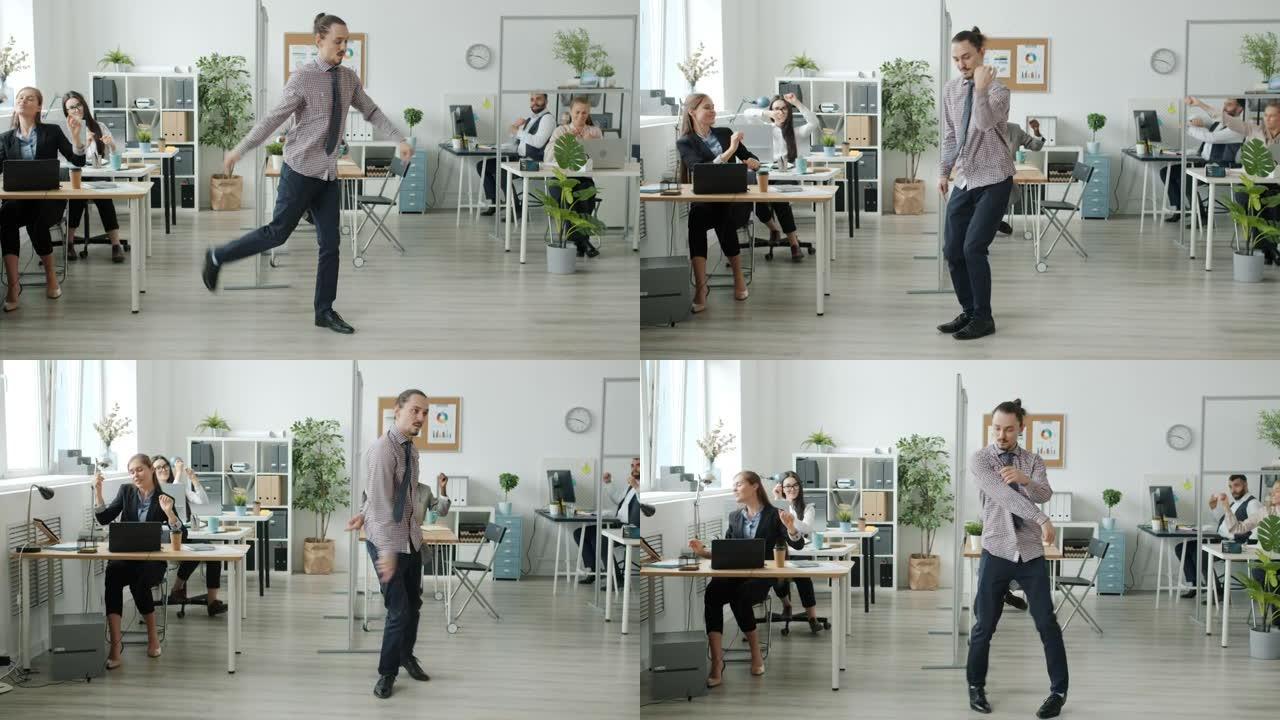 有创造力的人在办公室表演现代舞，而员工在背景中玩得开心