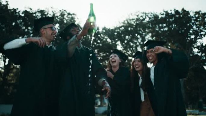 一群学生为庆祝毕业而打开一瓶香槟的4k录像