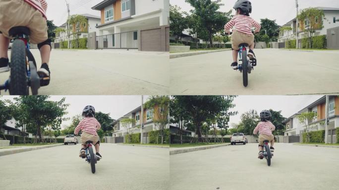 骑自行车的孩子。休闲运动骑行