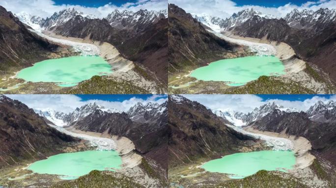 冰川从山顶涌入绿色的高山湖泊