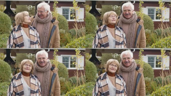 花园中一对老年白种夫妇的肖像