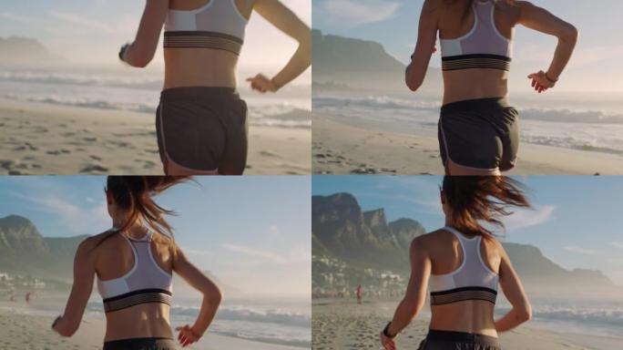 健康，活跃的运动员在海滩上跑步，训练健康的生活方式。慢跑者在夏天做早晨有氧运动和耐力锻炼。沿着山脉和