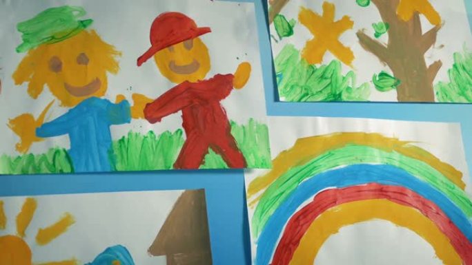 墙上移动镜头上的儿童绘画