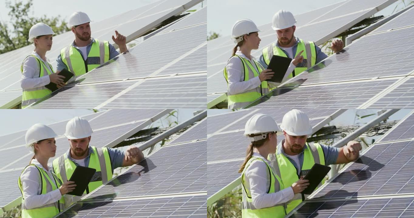 两名工程师检查太阳能电池板的4k视频片段