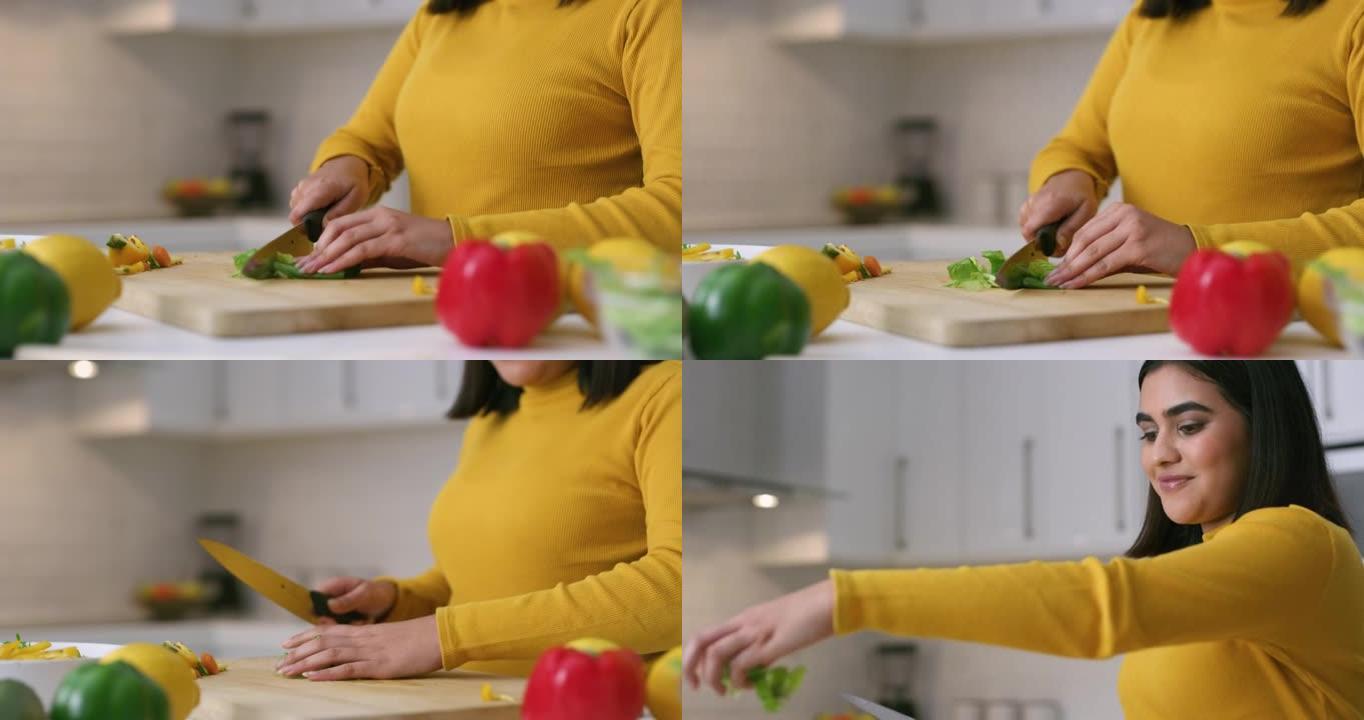 4k视频片段，一名年轻女子在家做健康的饭菜