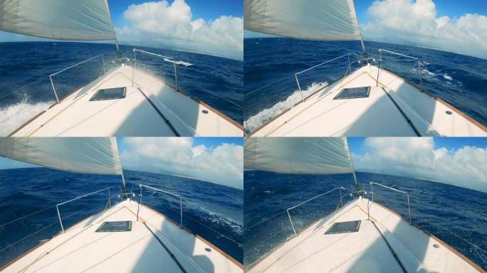 帆船以慢动作沿着蓝色的水域航行