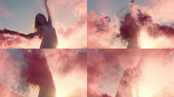 美丽的女人挥舞着粉红色的烟雾弹在日出时在海滩上跳舞，用俏皮的舞蹈运动庆祝创意自由