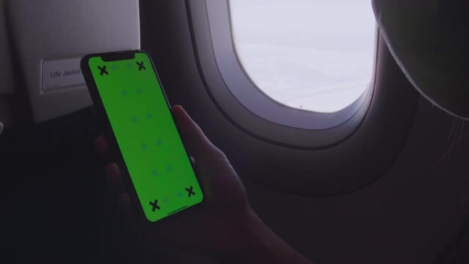 手动在平面绿色屏幕上使用智能手机