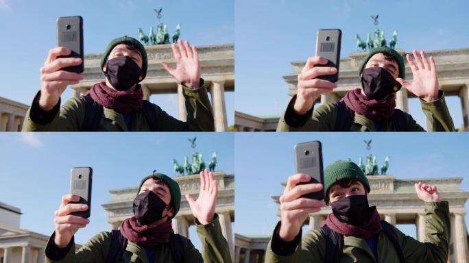 旅行者vlogger在勃兰登堡门前制作视频