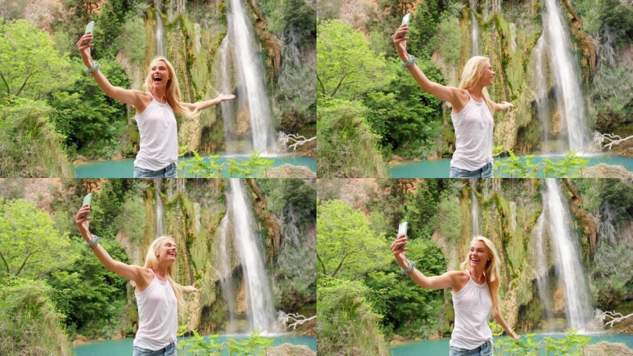 4k视频片段，一名妇女在喷泉中自拍