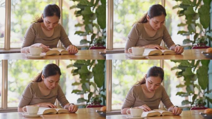 女人看书并在放松时间喝咖啡