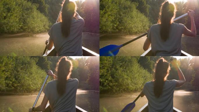 日落时乘独木舟探索一条迷人的绿色河流