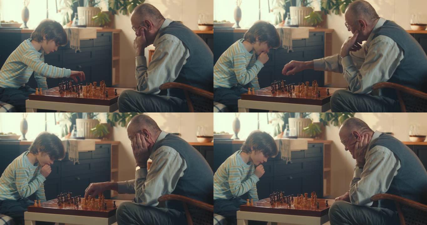 小天才。可爱的孩子男孩思考，在家里对老爷爷下棋。逻辑概念。