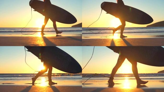 一个女孩拿着冲浪板，将冲浪板的电线绑在她在海滩上行走的左腿上
