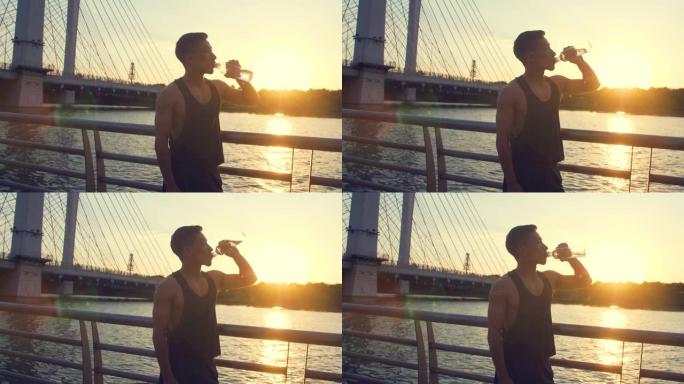 男子跑步运动后喝水