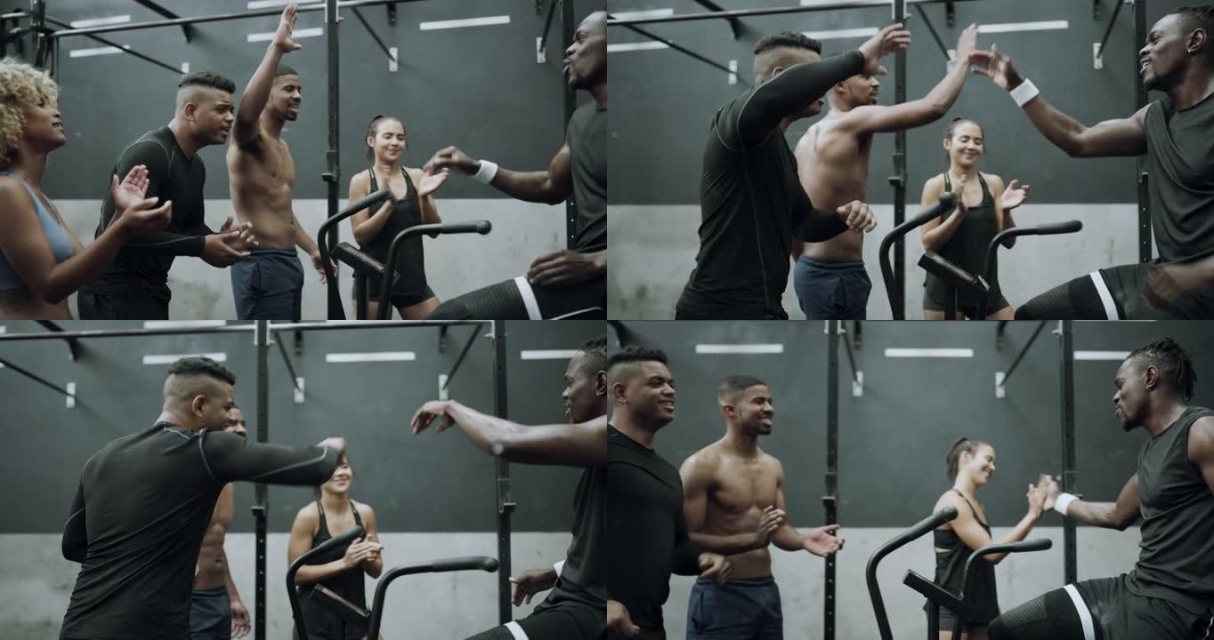 4k视频片段，一个年轻人在健身车上锻炼，而他的朋友鼓励他在健身房锻炼
