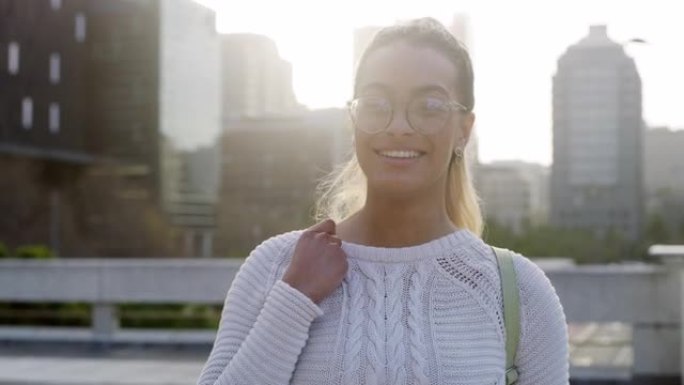 4k视频片段，一名迷人的年轻女子白天独自站在城市