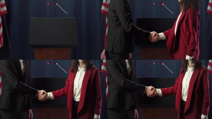 两名政治家进入参选人的行列，并握手