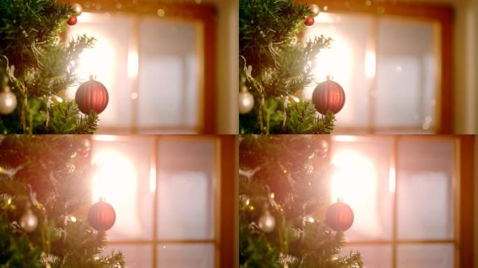 SLO MO闪闪发光的金色灰尘落在美丽的装饰圣诞树上