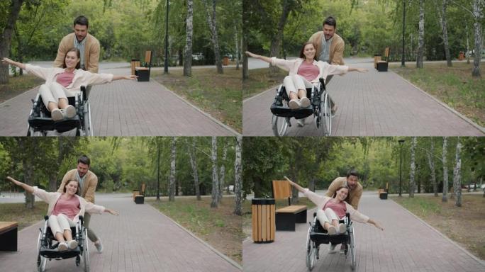 秋日坐在轮椅上的快乐男人和残疾女人在公园玩耍的慢动作