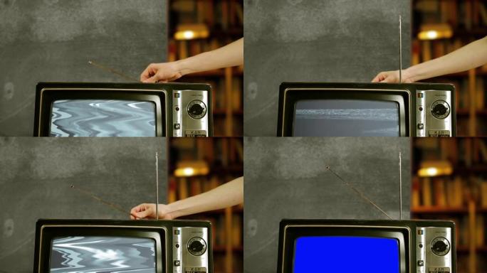 手动调节天线在旧电视机中调谐蓝屏。