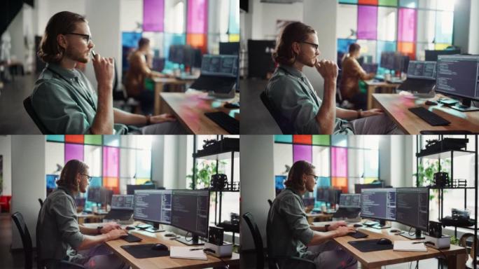专业男性程序员在台式计算机上编写代码，在时尚的办公室设置多个显示器。高加索人为人工智能创新初创公司做